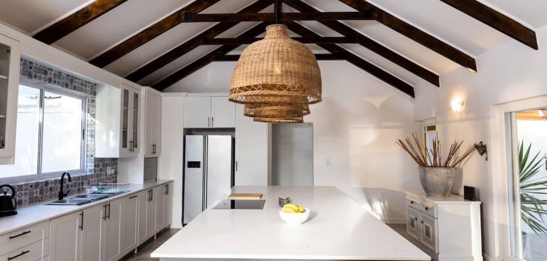 lighting-equipment-hanging-in-a-row-from-mansard-